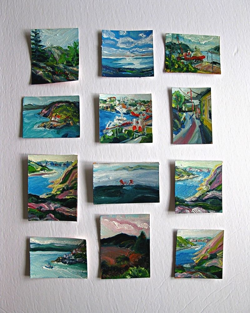 a picture of many mini landscape oil paintings painted on paper