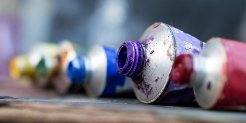 close up of oil paint tubes in many colours